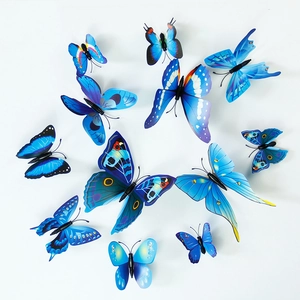 Set of 12 blue 3D butterfly wall stickers with realistic patterns for home wall decoration
