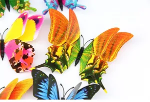 Close-up of colorful 3D double-layer artificial butterflies with realistic wing patterns