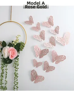 Detail of Style A rose gold 3D hollow butterfly wall sticker on a white floral background