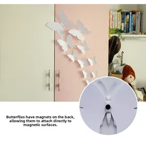 Detail of 3D white butterfly wall stickers showing built-in magnets for magnetic surfaces