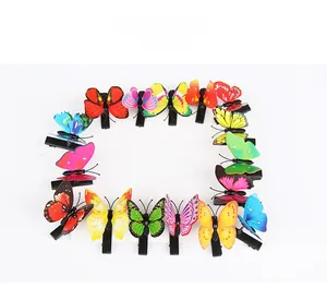 Selection of colorful butterfly hair clips with realistic patterns and metal alligator clips