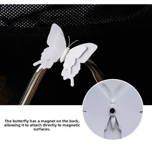 Detail of 3D white butterfly wall sticker with a built-in magnet for metal surfaces