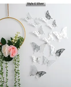 Silver 3D hollow butterfly wall stickers with intricate laser-cut floral metal texture