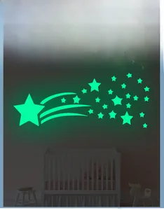Luminous glow-in-the-dark wall stickers featuring shooting stars and small stars for kids room