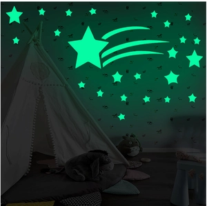 Luminous wall stickers set showing a large glowing comet and green fluorescent stars
