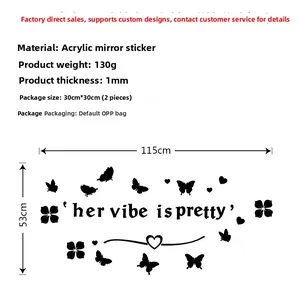 Detail showing acrylic mirror wall stickers with butterflies and her vibe is pretty text