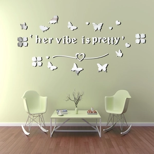 Detailed view of silver acrylic 3D mirror wall stickers with butterflies and quote