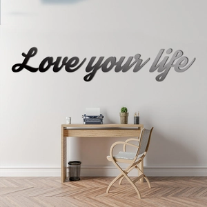 Modern black Love your life acrylic mirror wall decal in a minimalist home office setting