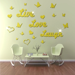 Detail of 3D gold acrylic mirror wall stickers featuring Live Love Laugh and butterflies
