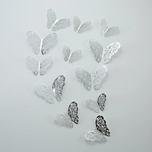 3D hollow silver butterfly wall stickers with intricate carved patterns for home DIY decor