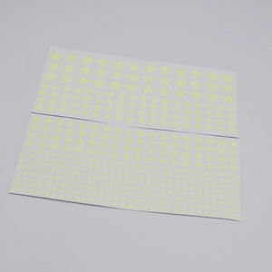 Detailed view of luminous star stickers in multiple sizes for wall and switch decoration