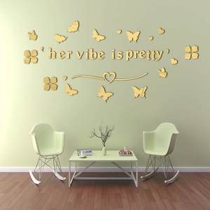 Golden acrylic mirror wall stickers with butterflies and 'her vibe is pretty' text