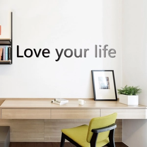 Detail of 3D acrylic mirror wall sticker featuring Love your life quote in home office