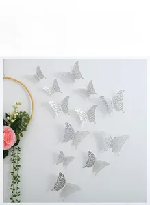 Detail of 3D hollow silver butterfly wall stickers with realistic metallic laser cut wings