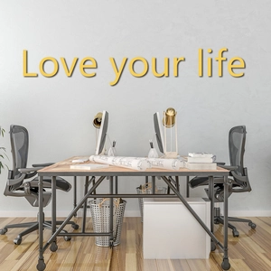 Detail of 3D yellow acrylic mirror wall sticker featuring Love Your Life quote in office