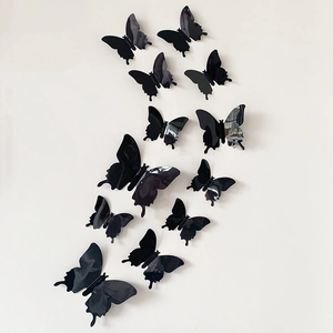 Lot de 12 autocollants muraux papillons 3D noirs avec effet miroir sur mur blanc
