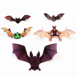 Detailed view of five unique 3D Halloween bat stickers including purple and green pumpkin designs