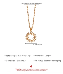 Detail of rose gold laurel leaf necklace showing dimensions and zircon inlay details