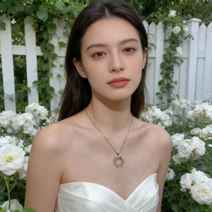 Elegant zircon floral pendant necklace on model in a romantic white rose garden
