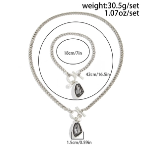 Dimensioni dettagliate di collana e bracciale con fibbia OT in argento con perla e pietra