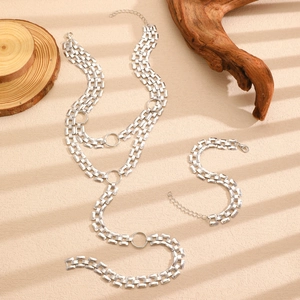 Detail of silver rectangle link Y-necklace and bracelet set with industrial clasp