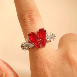 Gothic silver ring featuring double scarlet coffin-shaped gems and floral engraving