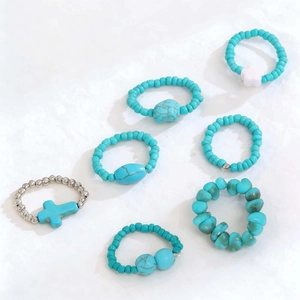 7-teiliges Boho-Ring-Set mit türkisfarbenen Perlen, Silberkreuz und Schmetterlingsanhänger