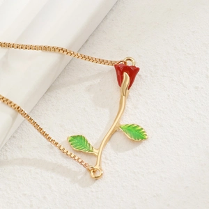 Vintage gold rose pendant bracelet with red enamel flower and green leaves on box chain