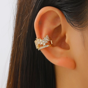 Gold plated ear cuff with pavé zircons and crown design for non-pierced ears