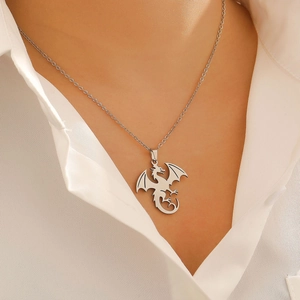Gothic silver dragon pendant necklace in stainless steel shown on a fashion model