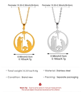 Detail view of round Nativity scene pendants in gold and silver stainless steel