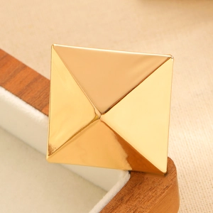 Minimalist polished gold pyramid square ring with a glossy geometric mirror finish