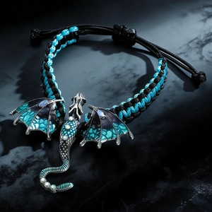 Pulsera de dragón tejida a mano con escamas de esmalte azul y cristales brillantes
