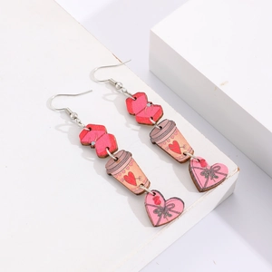Boucles d'oreilles pompon avec cœur rose et tasse de café pour la Saint-Valentin