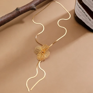 French vintage gold snake chain necklace with detailed brushed metal flower pendant