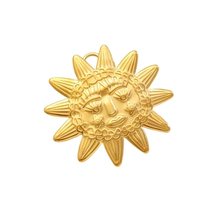 Luxurious sun face pendant in gold-plated stainless steel with detailed floral carvings