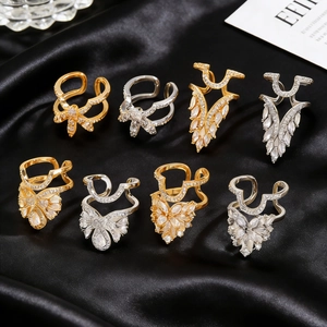 Copper butterfly and floral nail rings with sparkling cubic zirconia in gold and silver