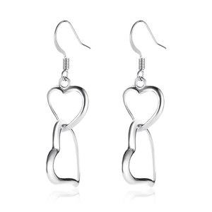 Elegant intertwined heart drop earrings in silver finish with polished metal texture