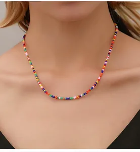 Close-up of colorful seed bead necklace featuring multi-color bohemian style pattern