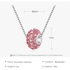 Macro shot of pink crystal Shambala pendant with silver box chain and dimensions