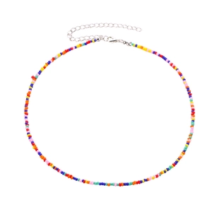 Colorful beaded choker necklace with ethnic geometric patterns and adjustable silver clasp