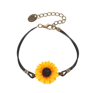 Retro sunflower leather cord bracelet with yellow daisy floral charm and bronze clasp