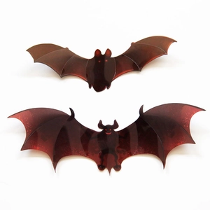 Detailed view of 3D PVC Halloween bat wall stickers with glowing red eyes and matte finish