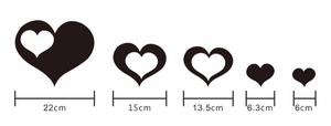Detailed dimensions of five heart-shaped black wall stickers in various sizes