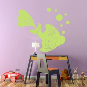 Close-up of glow-in-the-dark koi fish wall sticker with bubbles in a purple nursery room