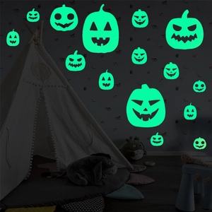Luminous Halloween pumpkin wall stickers with green glow for festive room decoration