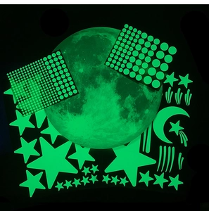 Luminous moon and stars wall stickers glowing in green light for kids bedroom decor