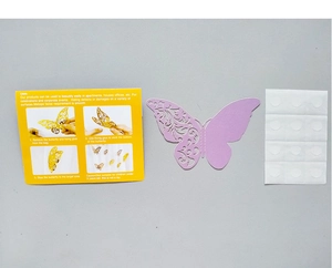 Detail view of 3D hollow butterfly wall sticker with installation guide and adhesive dots