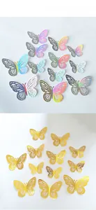 Macro detail of 3D hollow butterfly wall stickers with golden metallic finish and laser-cut wings