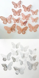 Detail of 3D hollow butterfly wall stickers in rose gold and silver metallic finishes